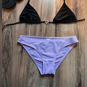 Women’s/Teens (Target or Walmart?) purple bathing suit bottoms.